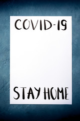 Covid-19 design template with the Stay at home message in handwriting and place for data