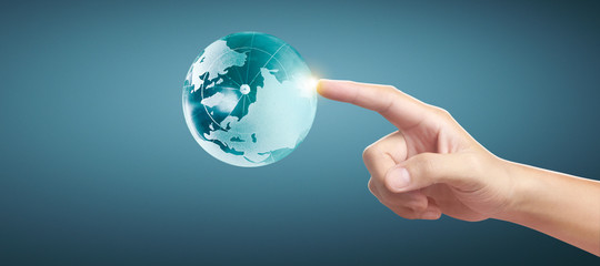 Globe ,earth in hand, holding our planet glowing. Earth image provided by Nasa