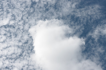 Clouds seen from below against blue sky