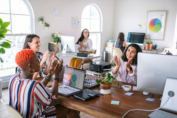 Happy colleagues at work