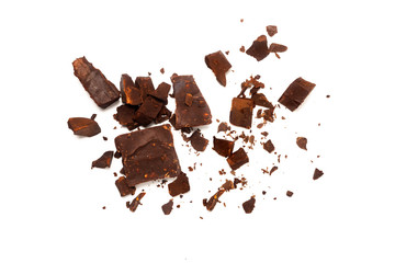 chocolate black pieces pile with almonds on white background