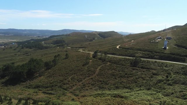 Aerial sweeping panorama hills coastline and fertile vineyards of Cape Prior located near the chapel of Santa Comba