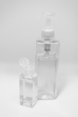 Bottle of instant antiseptic hand sanitizer transparent gel isolated on white background, no label. Antibacterial, hydro alcoholic gel, ethyl alcohol. Mini travel pocket small size, 8 fl oz, 50, 60 m