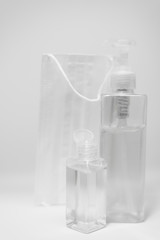 Hygienic face mask and Alcohol gel Sanitizer hand gel cleaners for anti Bacteria and virus on White Background, People using alcohol gel to wash hands to prevent COVID-19 virus