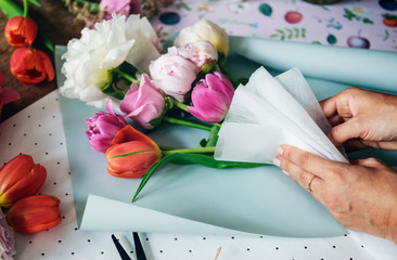 Woman arranging flowers