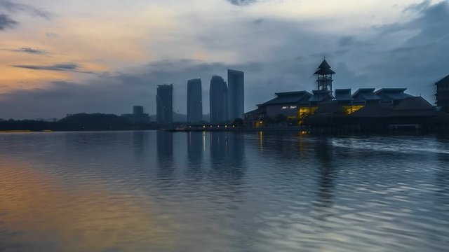 Beautiful sunrise by the lakeside in Putrajaya, Malaysia. Motion time lapse.