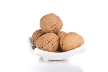 Walnuts on a white board