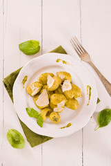 Potato gnocchi stuffed with pesto sauce.

