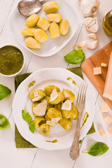 Potato gnocchi stuffed with pesto sauce.
