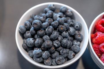 Fresh blueberries and raspberries in bowl