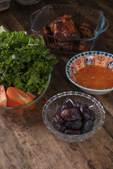 delicious sweet dates served with other main course as side dish during muslim fast breaking in ramadan month.