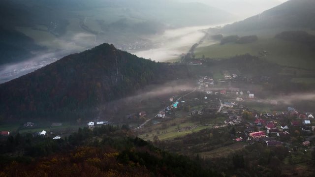 Rustical village at autumn morning with mist - Time lapse, Slovakia