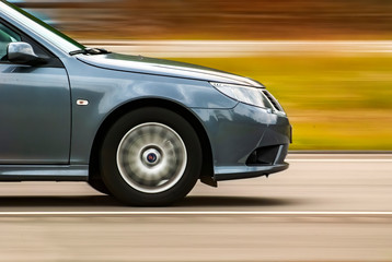Obraz premium fast car on the road