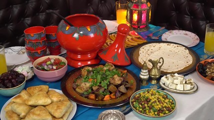 Iftar food table. Evening meal for Ramadan. Arabic cuisine. Middle Eastern traditional lunch. Assorted of oriental dishes