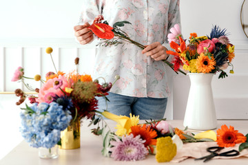 Woman arranging flowers