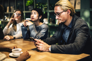 Diverse friends meeting at a cafe