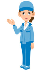 右上に手のひらを向け紹介する青い作業着の女性
