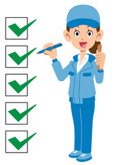 完了したチェックリストと青い作業服を着た女性
