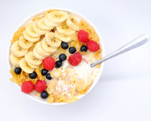 cereal in a white bowl on wooden background. Healthy breakfast concept.