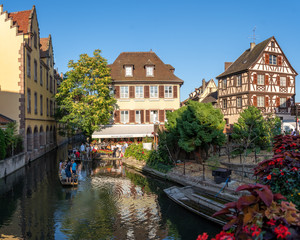 Quay view of the Little Venise. Typical half-timbered houses in the background. Town of Colmar, Haut-Rhin, Alsace, France.