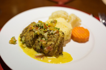 Rice with vegetables and fish meal. White steamed rice served with fish curry