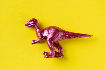 Aerial view of dinosaur toy with colorful background © Rawpixel.com