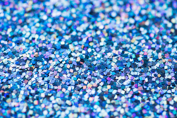 Blue sequin glitter textured background abstract