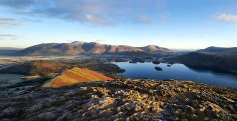 Sunrise over Derwent Water near Keswick with the summits of Skiddaw and Blencathra in the distance from Cat Bells on a cold winters morning in the Lake District.