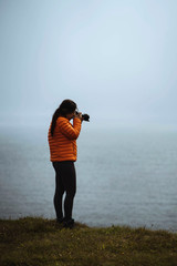 Travel photographer by the sea