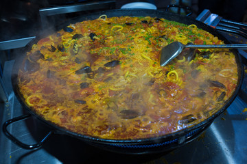 Paela dish in large cast iron pan