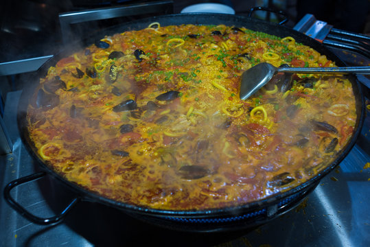Paela dish in large cast iron pan
