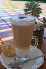 Coffee drink in a tall glass Flat white or cappuccino
