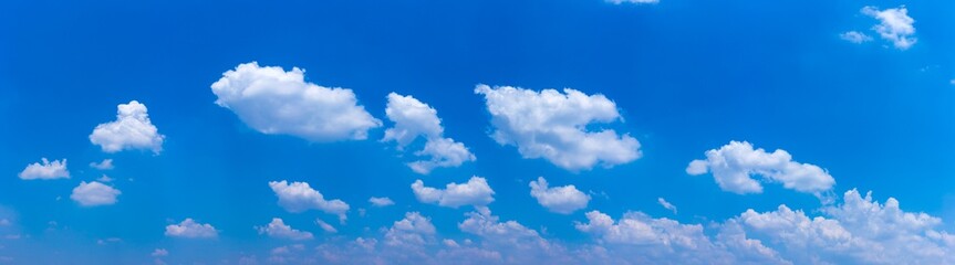 Naklejka na ściany i meble Panorama blue sky background with tiny clouds.