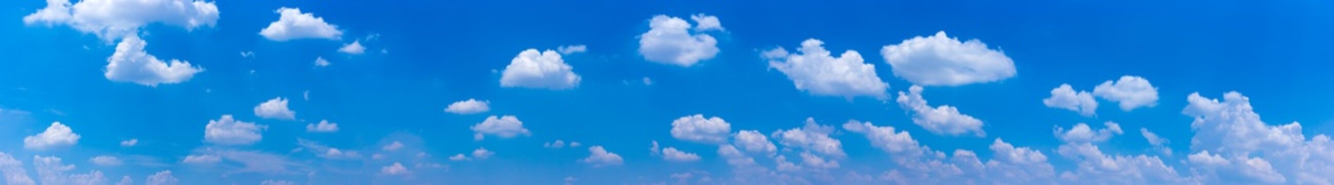 Panorama blue sky  background with tiny clouds.