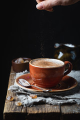 Coffee cup cappuccino with cinnamon, vintage style effect picture