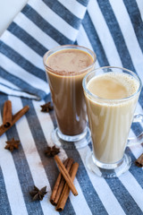 Iced coffee with milk in tall glasses, Cups of tasty frappe coffee, Latte machiato, two cups of...