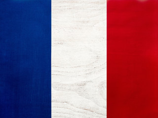 French Flag. Beautiful greeting card. Close-up, view from above. National holiday concept. Congratulations for family, relatives, friends and colleagues