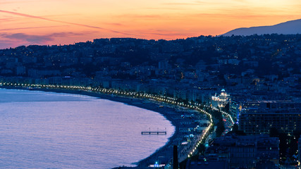 Fototapeta premium Evening aerial view of Nice from viewpoint on Castle Hill at sunset