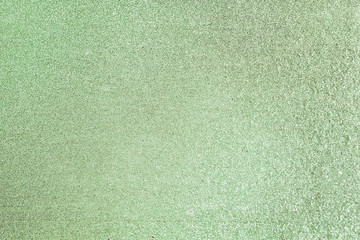 Fototapeta premium Glittery green paper background