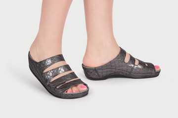 Pair of blank soft gray home slippers, design mockup. Hotel bath slippers top view isolated on white background. Clear warm domestic sandal or sneakers. Bed shoes accessory footwear. Sandals flip flop