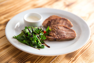 beef steak with green salad