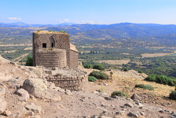 Fototapeta premium Ruins of ancient fortress tower, Assos, Canakkale, Turkey