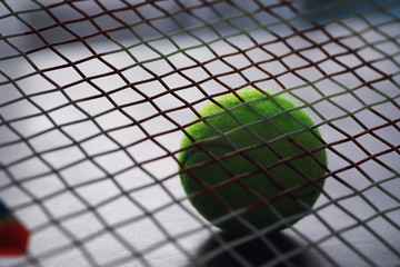 Sport and healthy lifestyle. Tennis. Yellow ball for tennis and a racket on the table. Sports...
