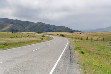 road 83 bends in hilly countryside, Otematamata, New Zealand