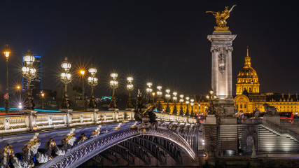 Fototapeta na wymiar Beautiful view of Pont Alexandre III, bridge with golden sculptures and street lamps, Paris, France