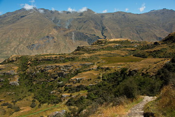 Fototapeta na wymiar Hiking track to the summit of Rocky Mountain near Wanaka in Otago on South Island of New Zealand 
