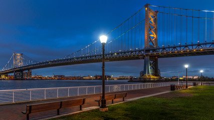 Fototapeta na wymiar Landscape view of Benjamin Franklin Bridge in Philadelphia PA