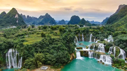 Fototapete Wasserfall Ban Gioc waterfall, Vietnam, panoramic view. One of the most beautiiful waterfalls in the world.  © Diego