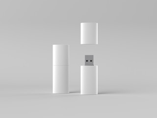 Two flash drives on a white surface