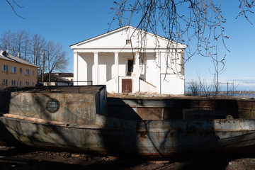 
old iron boat and city culture house